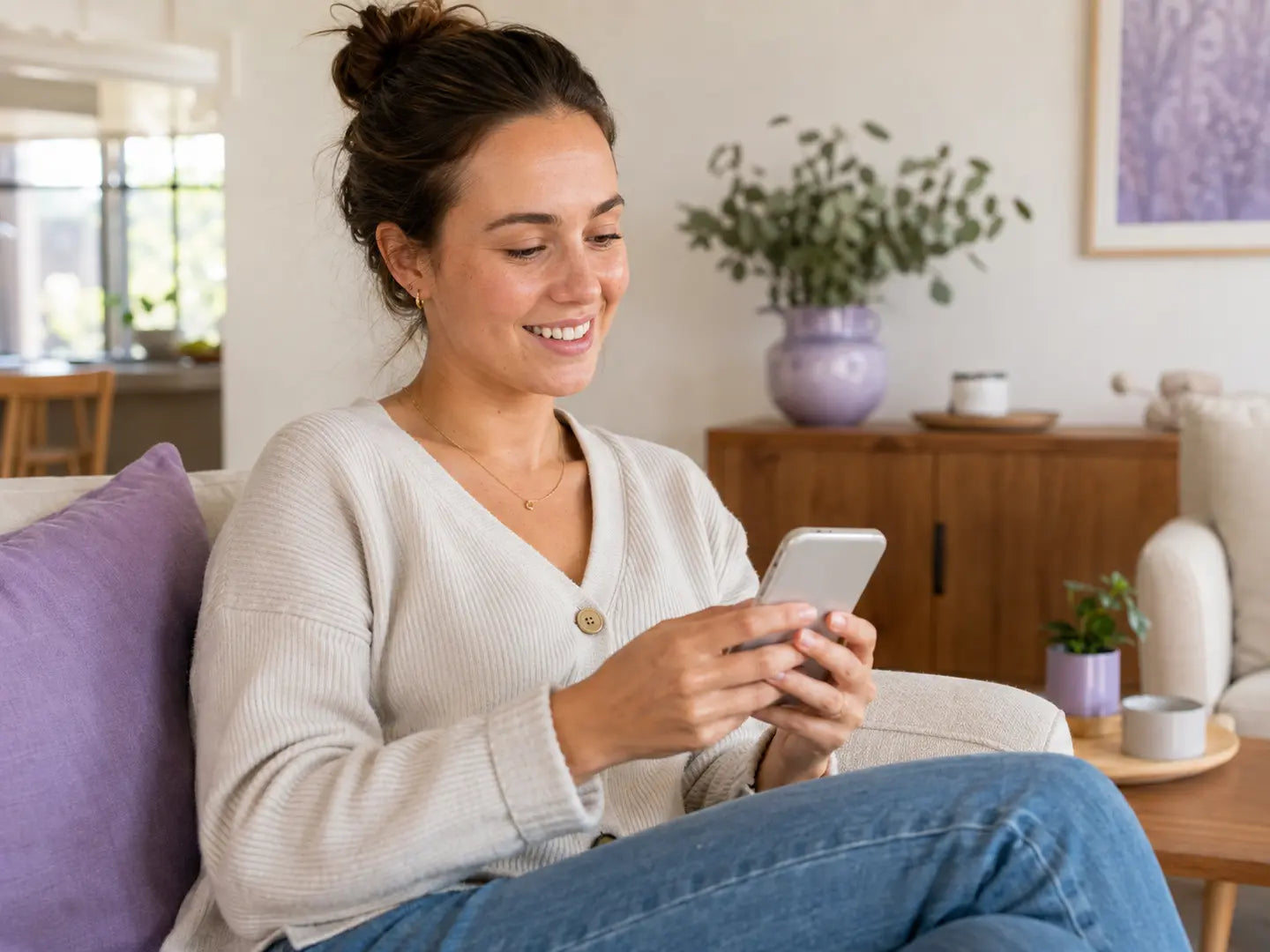 Patient holding custom clear aligners at home