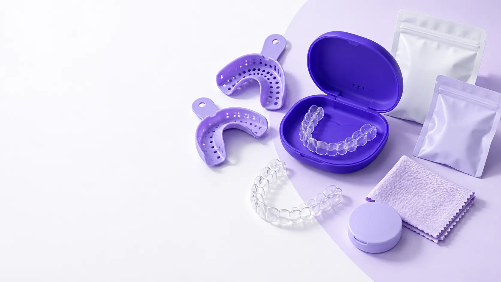 SmileWide aligner care products arranged on a clean white surface